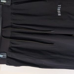 NOBULL MEN'S LIGHTWEIGHT WOVEN TRACK PANT